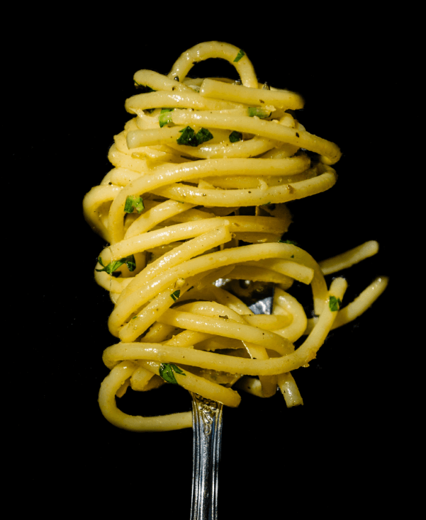 Eating pasta with fork