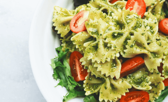 spinach pasta with tomatoes.